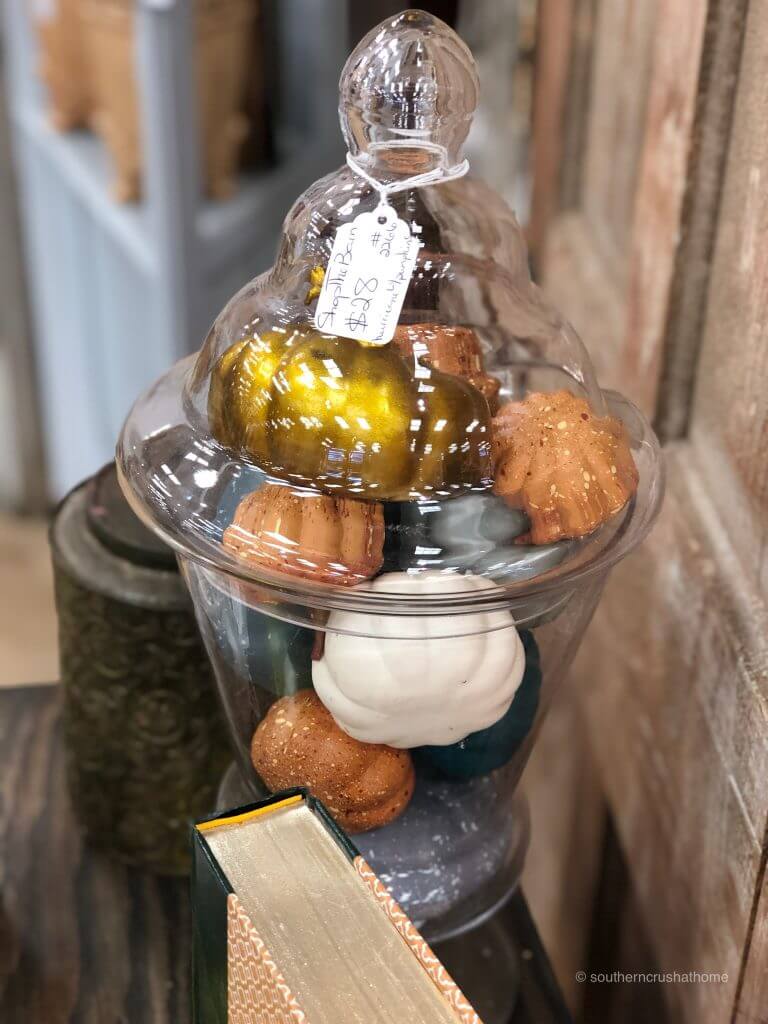 pumpkins in an apothecary jar