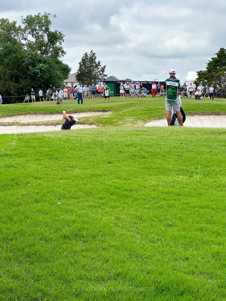 pga player playing from the sand