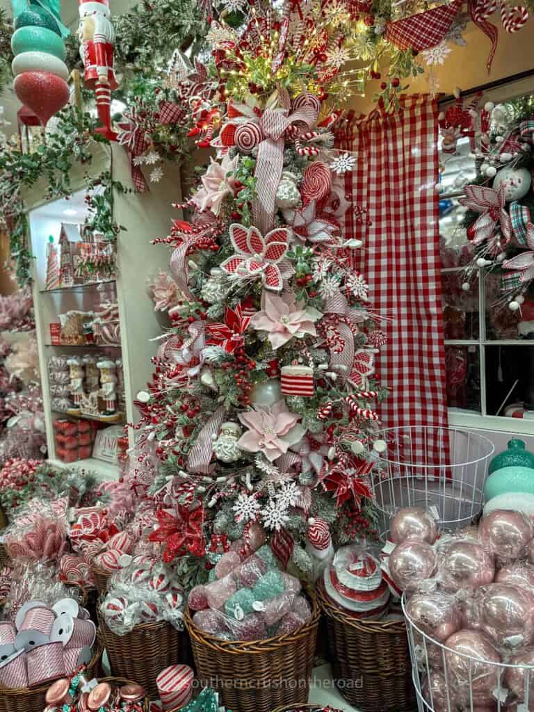 red and white christmas tree with peppermints