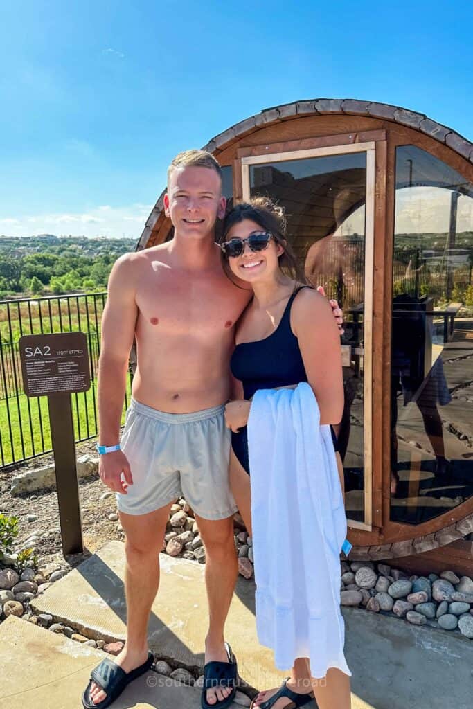 Brady and Hadley in front of the sauna at worldsprings